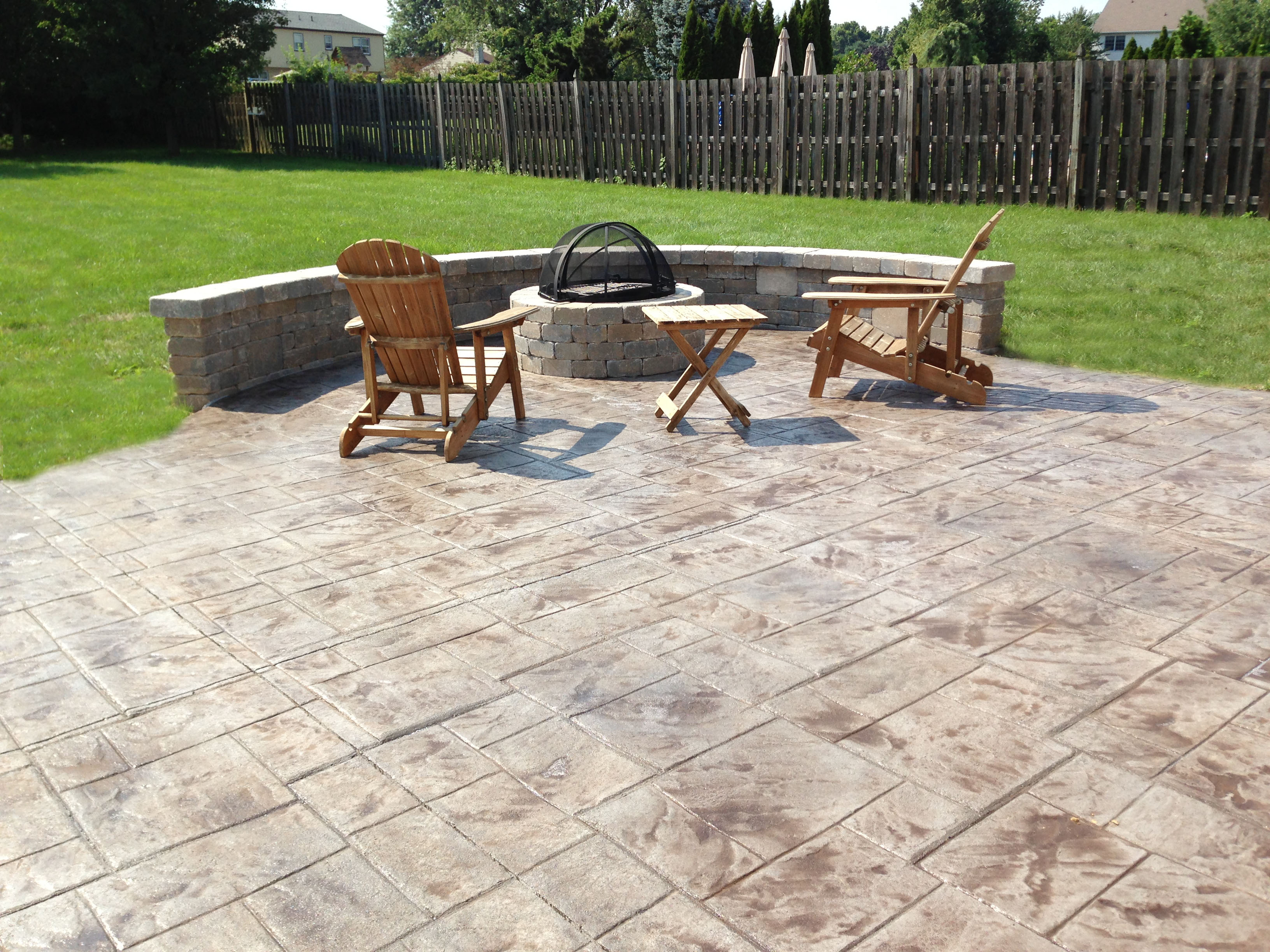 Stamped Concrete Patio with sitting wall and fire pit ...